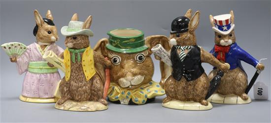 Four Royal Doulton Bunnykins teapots and a Royal Doulton The March Hare figural mug: